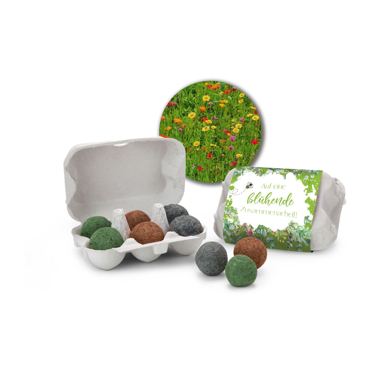 6 farbigen Samenbomben für eine bunte Bienenwiese in einer Mini-Eierschachtel mit Banderole: „Auf eine blühende Zusammenarbeit”
