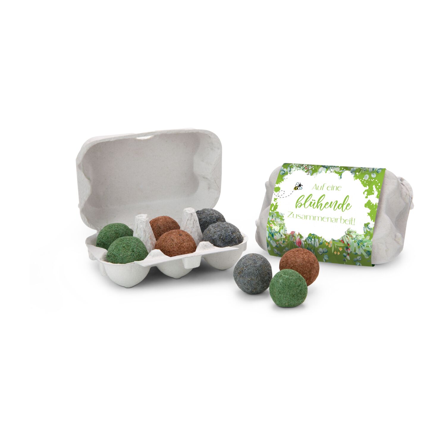 6 farbigen Samenbomben für eine bunte Bienenwiese in einer Mini-Eierschachtel mit Banderole: „Auf eine blühende Zusammenarbeit”