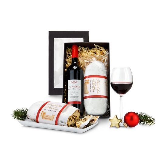 Ein harmonischer, französischer Cabernet Sauvignon & ein leckerer Christstollen (750 g) mit festlicher Banderole. Schwarzer Geschenkkarton.