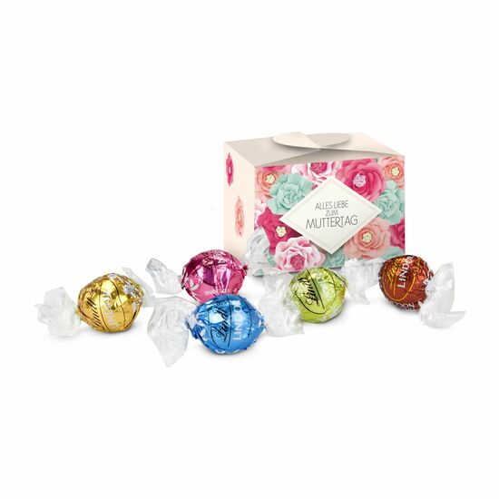 Diese kleine Pralinenschachtel enthält 5 Lindt-Lindor Kugeln in den Sorten Erdbeer-Sahne, Stracciatella, Pistazie, Weiße Schokolade & Nuss