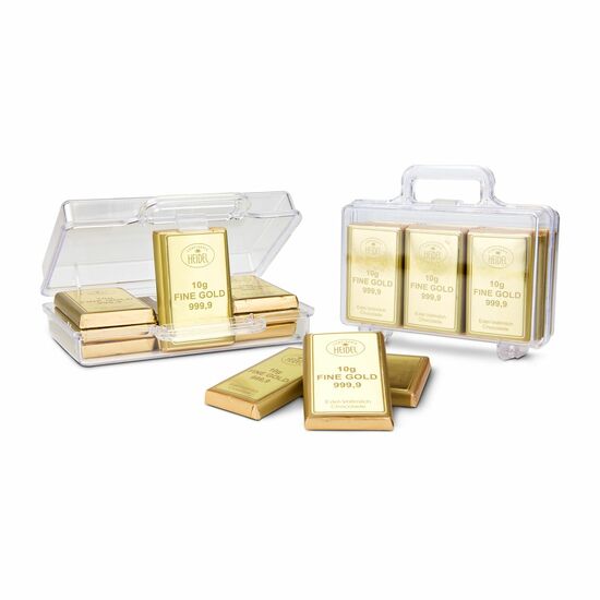 Ein süßer Goldkoffer mit 12 Goldbarren aus Edelvollmilchschokolade (120 g). Erhältlich mit „Sie sind Gold wert” und „Du bist Gold wert”.
