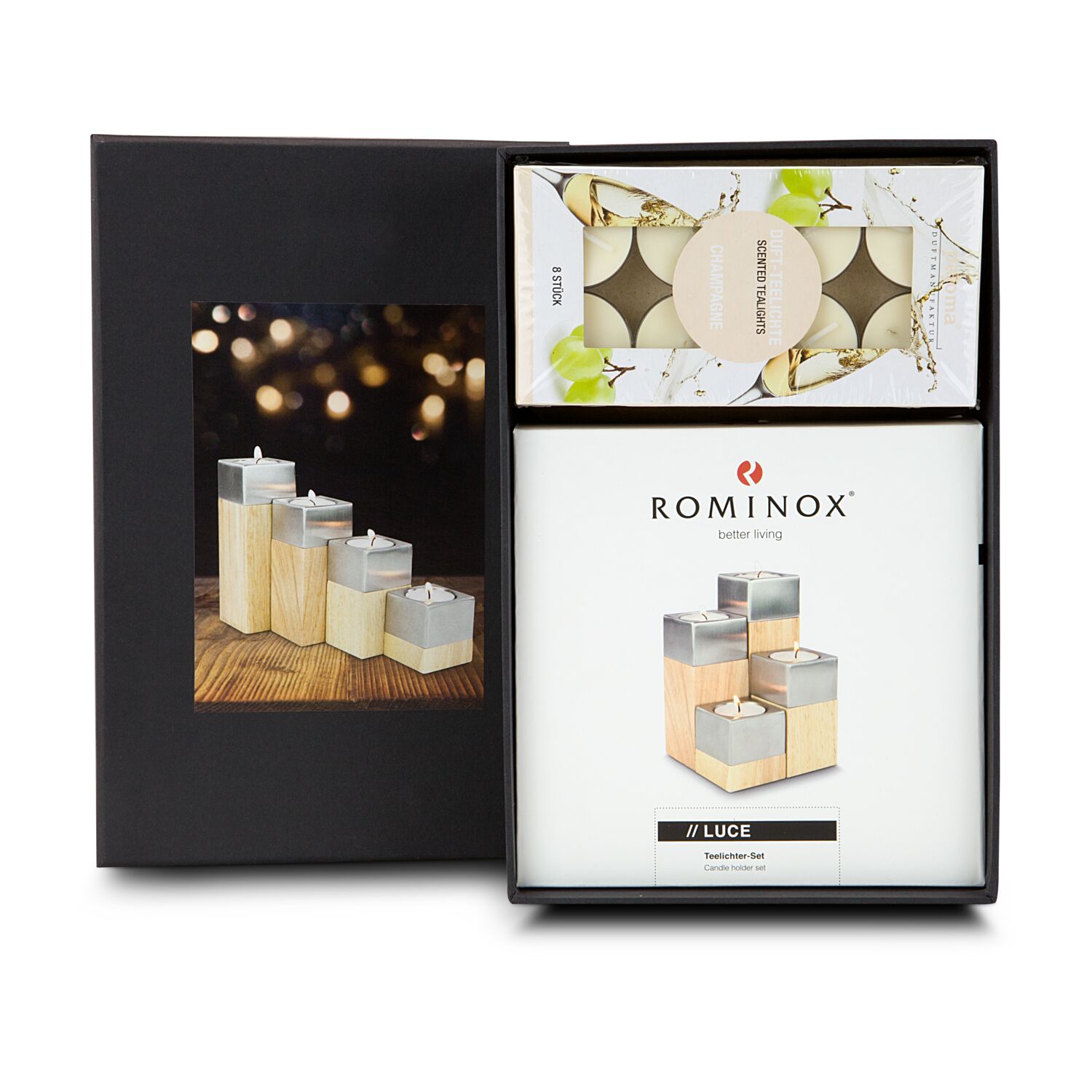 Ein ROMINOX® Kerzen-Quartett mit vier unterschiedlich hohen Holz-Edelstahlquader und 8 edle Duftkerzen Teelichter mit Champagner-Duft.