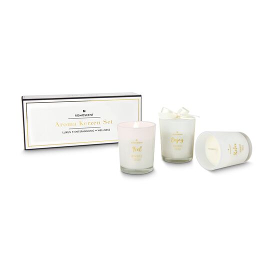 Eine Flasche hochwertiger Secco aus deutschem Anbau (0,75 l) und ein Aromakerzen-Set mit 3 Vanille-Kerzen.