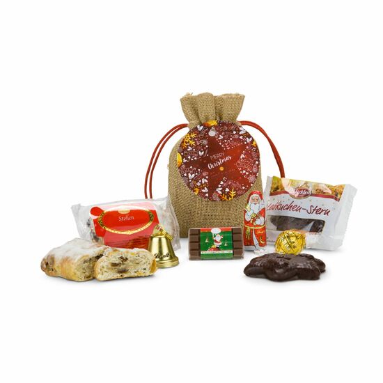 Säckchen gefüllt mit Mini-Stollen (80 g), Lebkuchenstern (28 g), Schokotäfelchen (10 g), Nikolaus (10 g) und Lindt Lindorkugel (12,5 g)