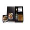 Eine Flasche Whisky, ROMINOX® Whiskysteine, ein Whisky Rezeptbuch und ein ROMINOX® Untersetzer-Set verpackt in einem schwarzen Karton.