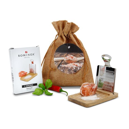 Sie erhalten die ROMINOX® Gewürzreibe Aroma mit Ständer und dazu rötliches Kristallsalz (Salzbrocken, ca. 50 g) im hellbraunen Jutesäckchen.