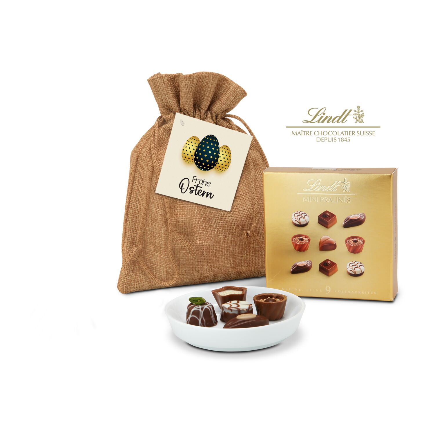 Edle Porzellanschale (ca. ø 10 cm) und 9 kleine Lindt Mini Pralinés (44 g) verpackt in einem Jutesäckchen für Ostern