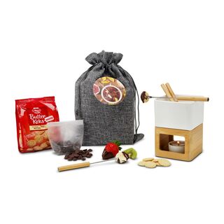 ROMINOX® Schokoladenfondue Dolce, dazu Schokodrops und leckere Mini-Butterkekse - verpackt im großen grauen Jutesack.