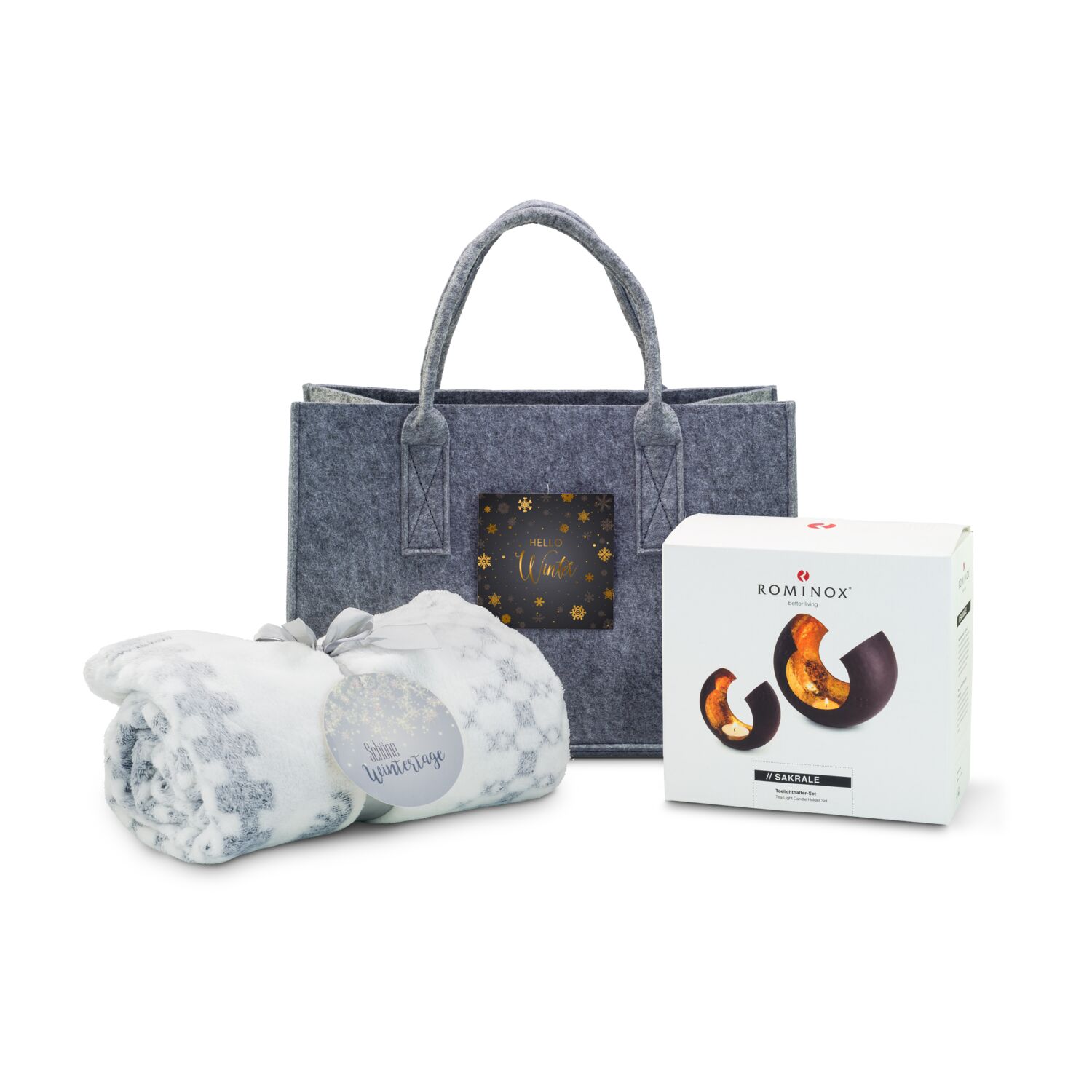 Die flauschige Kuscheldecke Rudolph und zwei seidenmatt-braune ROMINOX® Teelichthalter verpackt in einer ROMINOX® Filztasche mit „Hello Winter“-Anhänger.
