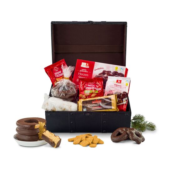 Knusper-Miniplätzchen, Mini-Spekulatius, Baumkuchen, Dominosteine, Lebkuchenherzen, Lebkuchen und Stollen verpackt in einer Schatzkiste.