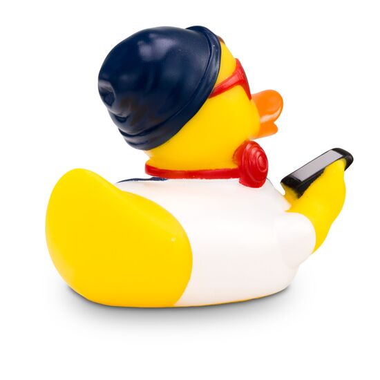 gelbe Werbeente Hannes Hipster mit weißem Shirt, Latzhose, Mütze und Kopfhörer, Größe: ca. 8 cm. Inklusive Quietschventil