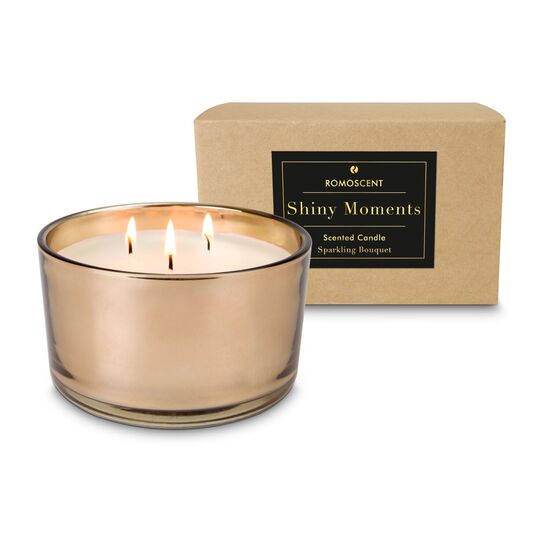 Luxuriöse 3-Dochtkerze in edlem kupferfarbenem Glas. Duftet nach exotischen Blumen. Brenndauer: ca. 30h